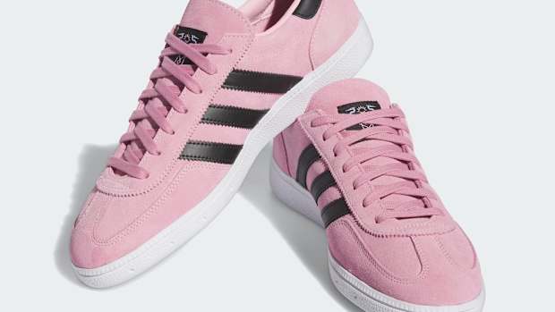 View of Lionel Messi's pink and black adidas sneakers.